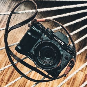 Close-up of camera on table