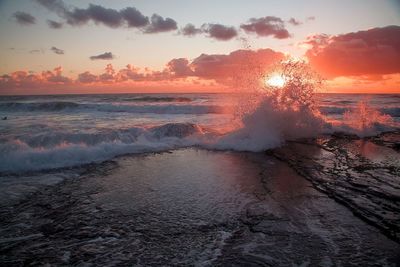 Scenic view of sea against sky during sunset