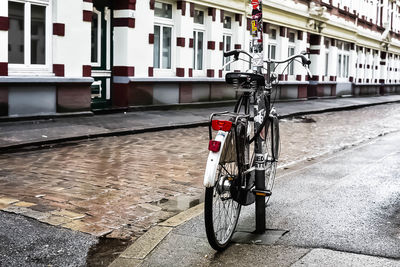 Bicycle on sidewalk in city
