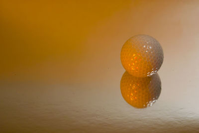 Close-up of orange fruit on table