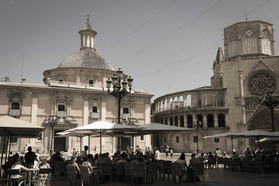 People in front of historic building