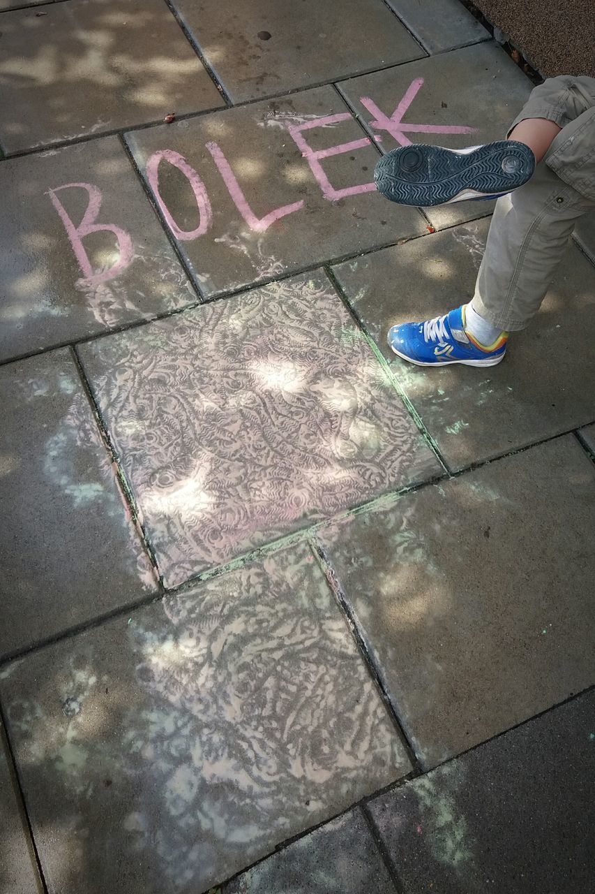 high angle view, shadow, flooring, outdoors, footpath, day