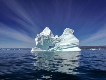 Scenic view of frozen sea against sky