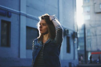 Portrait of young woman looking away