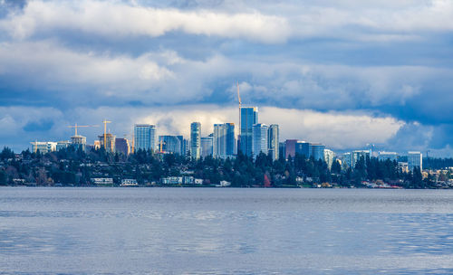 Puffy clouds hang over the bellevue skyline in washingoton state.