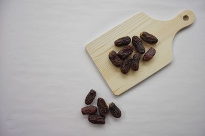 High angle view of food on table against white background