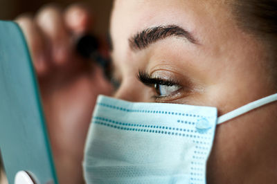 Close-up of woman wearing mask