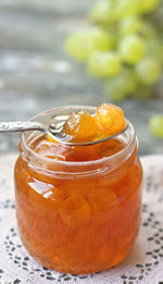 Close-up of drink in glass jar on table