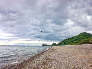 Scenic view of beach against sky