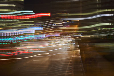 High angle view of light trails at night