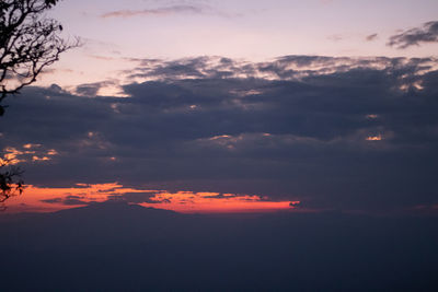 Low angle view of dramatic sky during sunset