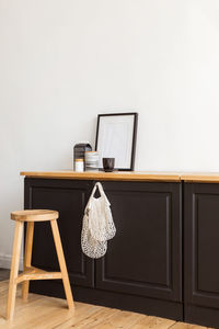 Cupboard with cloth bags and decorations