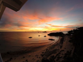 Scenic view of sea at sunset