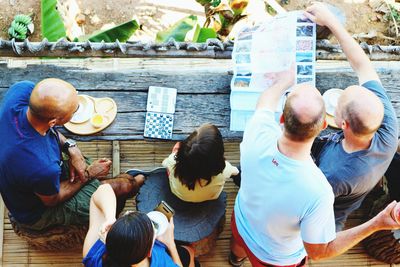 High angle view of people sitting outdoors