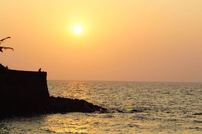 Scenic view of sunset over sea