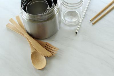 High angle view of kitchen utensils on table