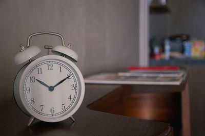 Close-up of alarm clock in living room, interior decoration object