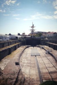 View of dry dock against sky in city