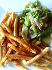 Close-up of served food in plate