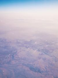 High angle view of cloudscape over landscape against sky