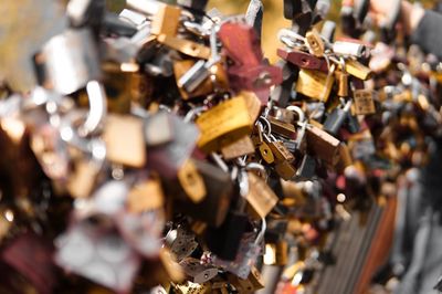 Close-up of love locks on railing