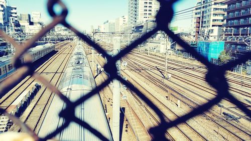 Chainlink fence by building in city