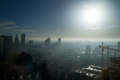 High angle view of modern buildings in city against sky