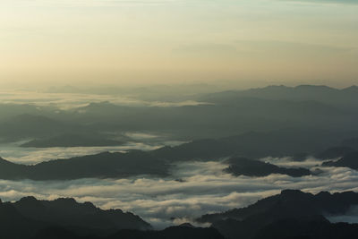 Scenic view of mountains against sky during sunset