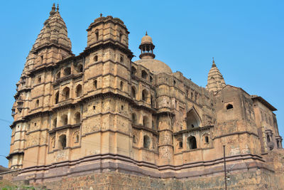 Low angle view of historic building against sky