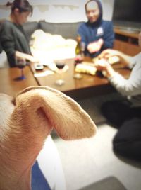 Group of people sitting on table