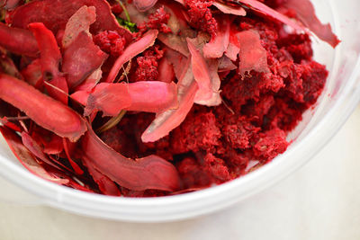 High angle view of red chili peppers in bowl