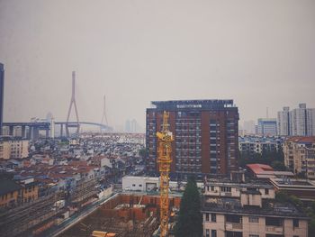 View of cityscape against clear sky