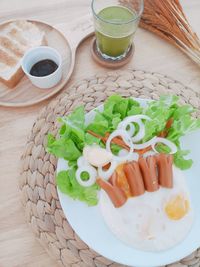 High angle view of breakfast served on table