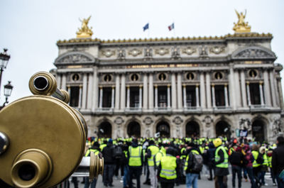 Group of people in front of building