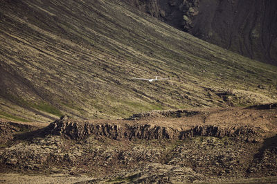 Aerial landscape of aircraft among powerful mountains