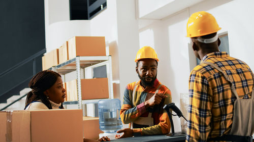 Rear view of man working in office