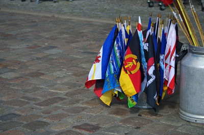 High angle view of multi colored flags on street