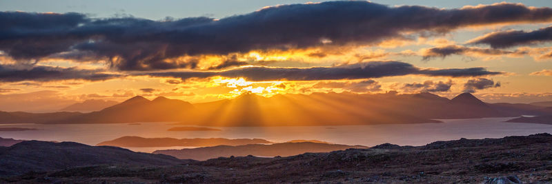 Scenic view of dramatic sky during sunset