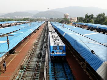 High angle view of train on railroad tracks against sky