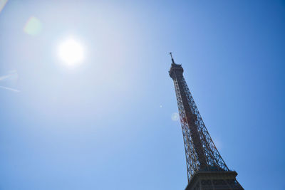 Low angle view of tower against blue sky