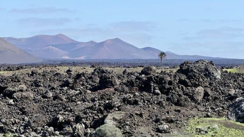 Panoramic view of landscape and mountains against sky