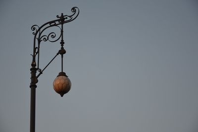 Low angle view of street light against clear sky