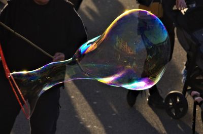 Bubbles on street in city
