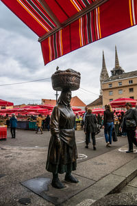 Silhouette of woman against sky