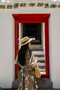 Rear view of woman wearing hat