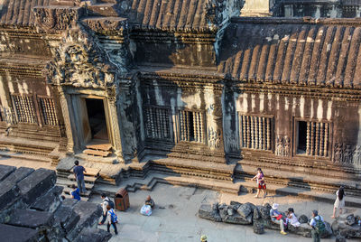 Group of people in front of historic building