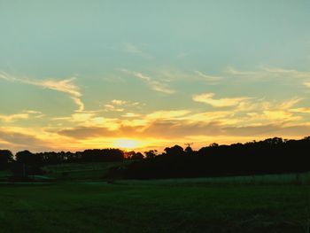 Scenic view of silhouette landscape against sky during sunset