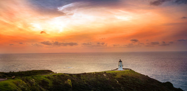 Scenic view of cape reinga lighthouse during sunset, new zealand, may 2022.