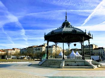 Gazebo in temple building against sky