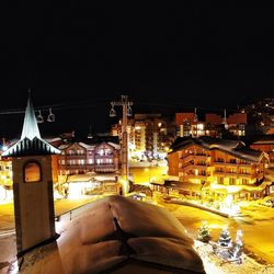 Buildings in city at night